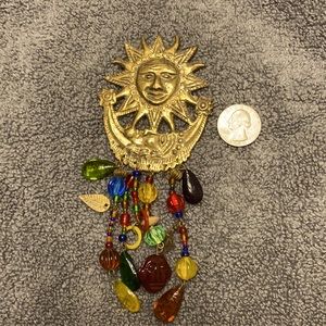 Huge sun brooch